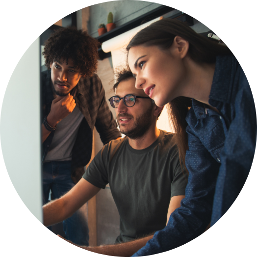 startup team looking at business loan interest rates on the computer